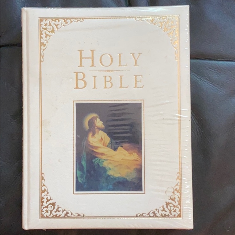 Holy Bible NEVER opened, still wrapped in plastic